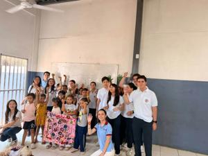 Volunteers and girls, together