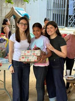 Volunteers and a student