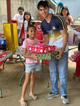 Handing over a wrapped gift